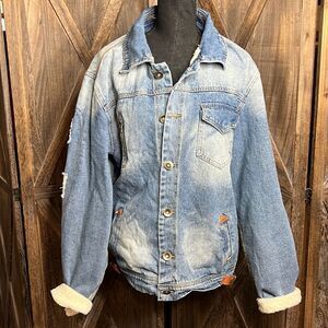 Machine distressed jean jacket